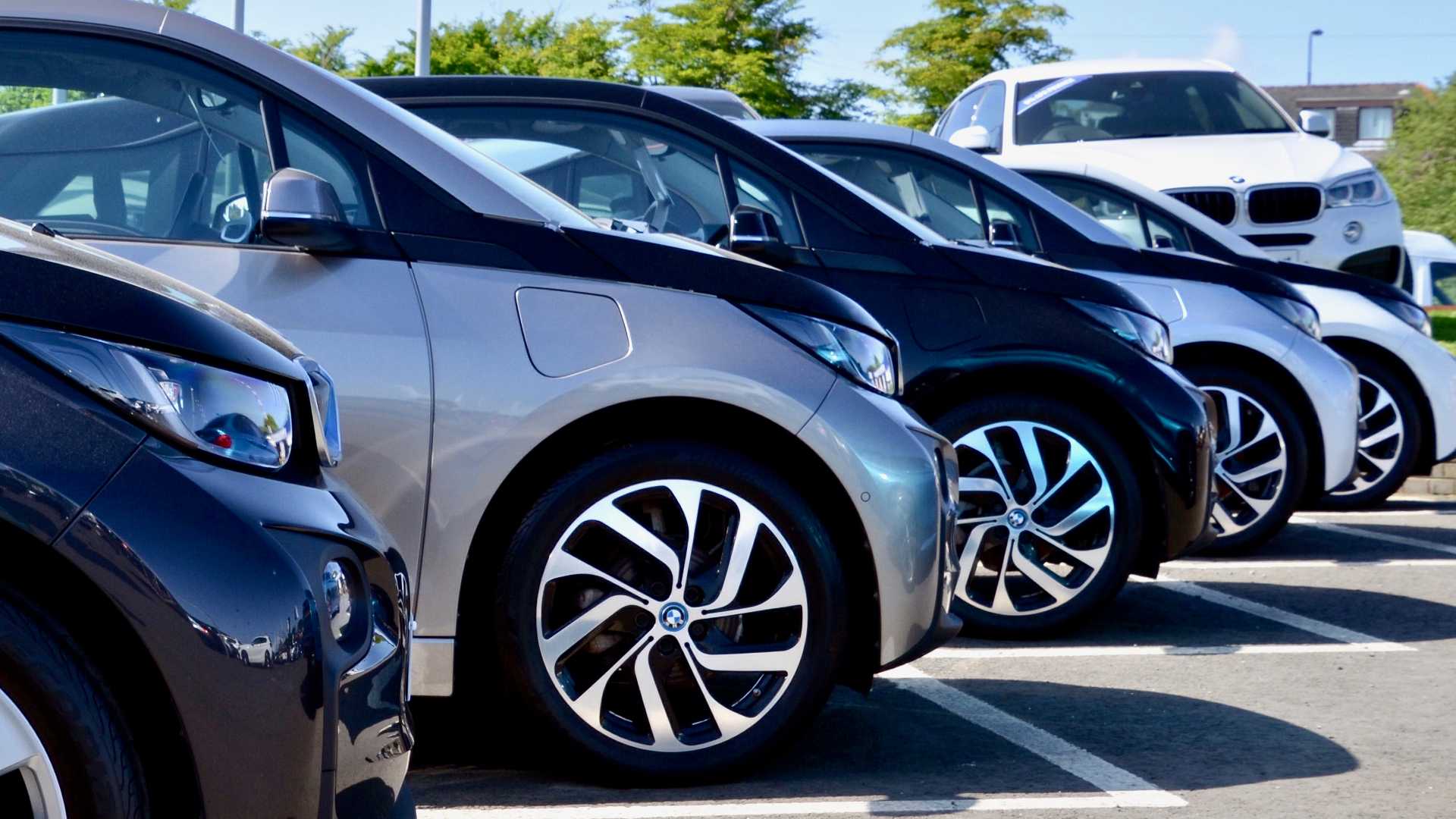 Row of BMW i3 electric cars at Peter Vardy Garage Edinburgh Scotland